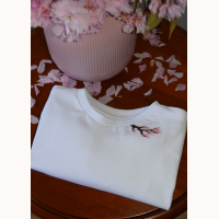 Organic hand embroidered Cherry Blossom branch t-shirt for girls.