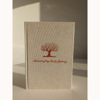 Memoirs of my Daily Journey is your beautiful crafted journal and your daily companion where you can print your life story in your own handwriting. Fully bound cotton fabric hardcover, 3 content pages, inspirational quotes throughout the journal, 265 pages, size 14X21 cm, 2 cotton ribbons made in Japan, debossed detail and debossed title on the cover, copper foil printing on the cover, undated, 100% biodegradable recyclable FSC certified paper, made by hand.