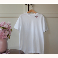 Embroidered organic t-shirt for girl with cherry blossom branch.